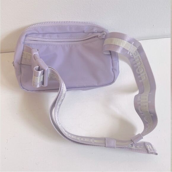 NWOT Lululemon Everywhere Belt Bag 1L
Wordmark- Lilac Ether/White Opal/White - Picture 10 of 16